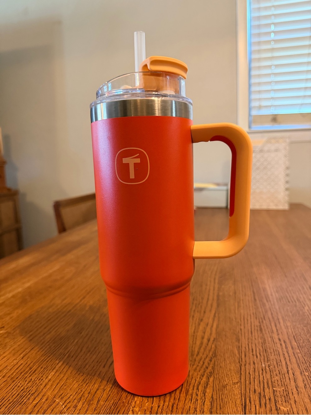 Tupperware Orange Travel Tumbler with Peach Handle and Clear Lid. 37 oz.
